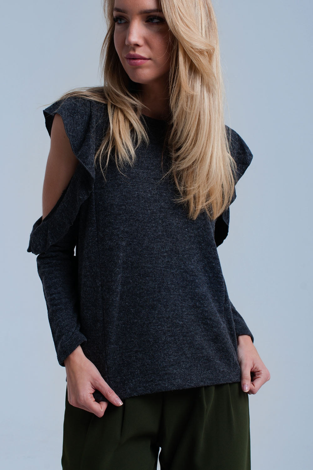 Dark gray top with ruffle and open detail