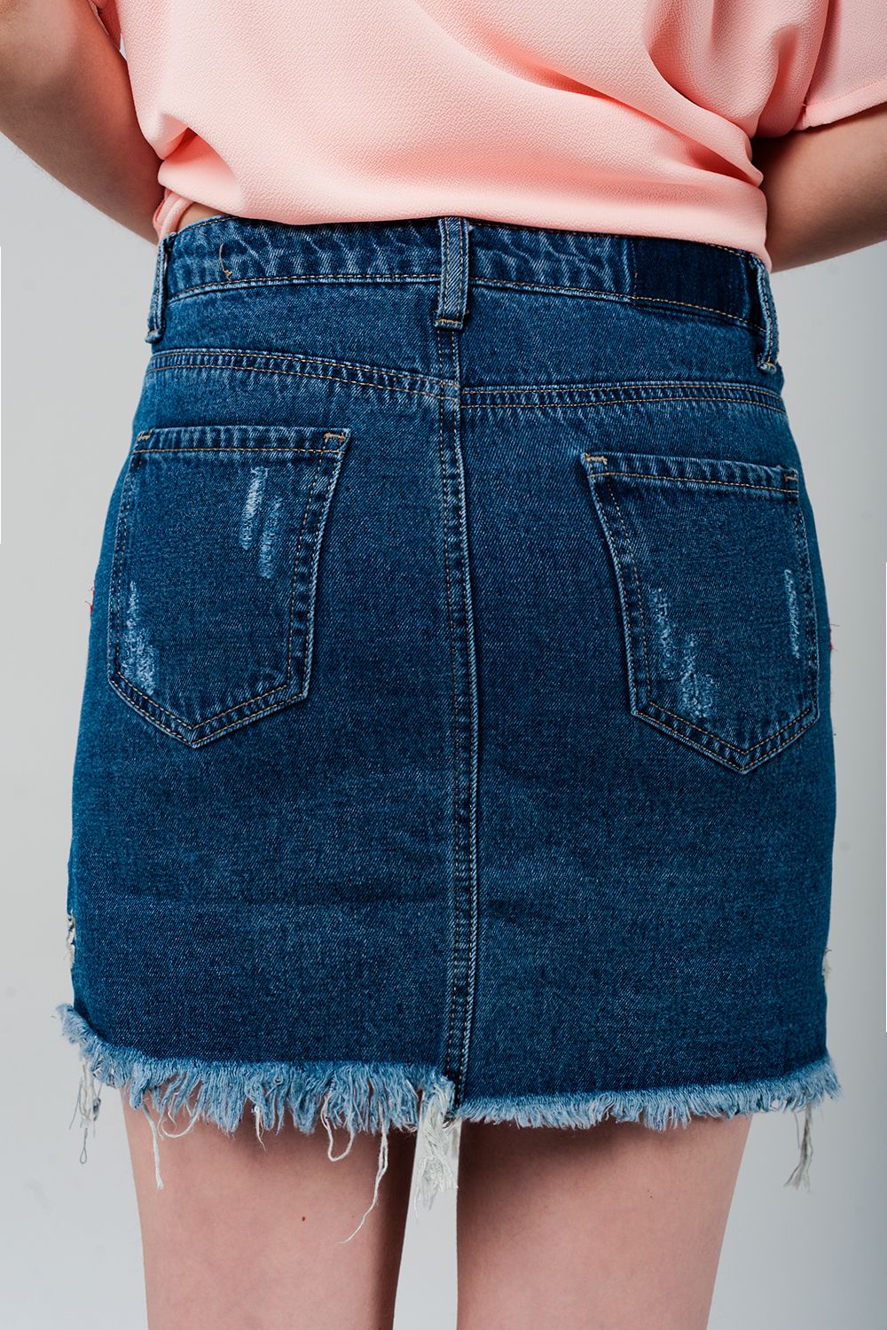 Denim mini skirt with embroidered flowers