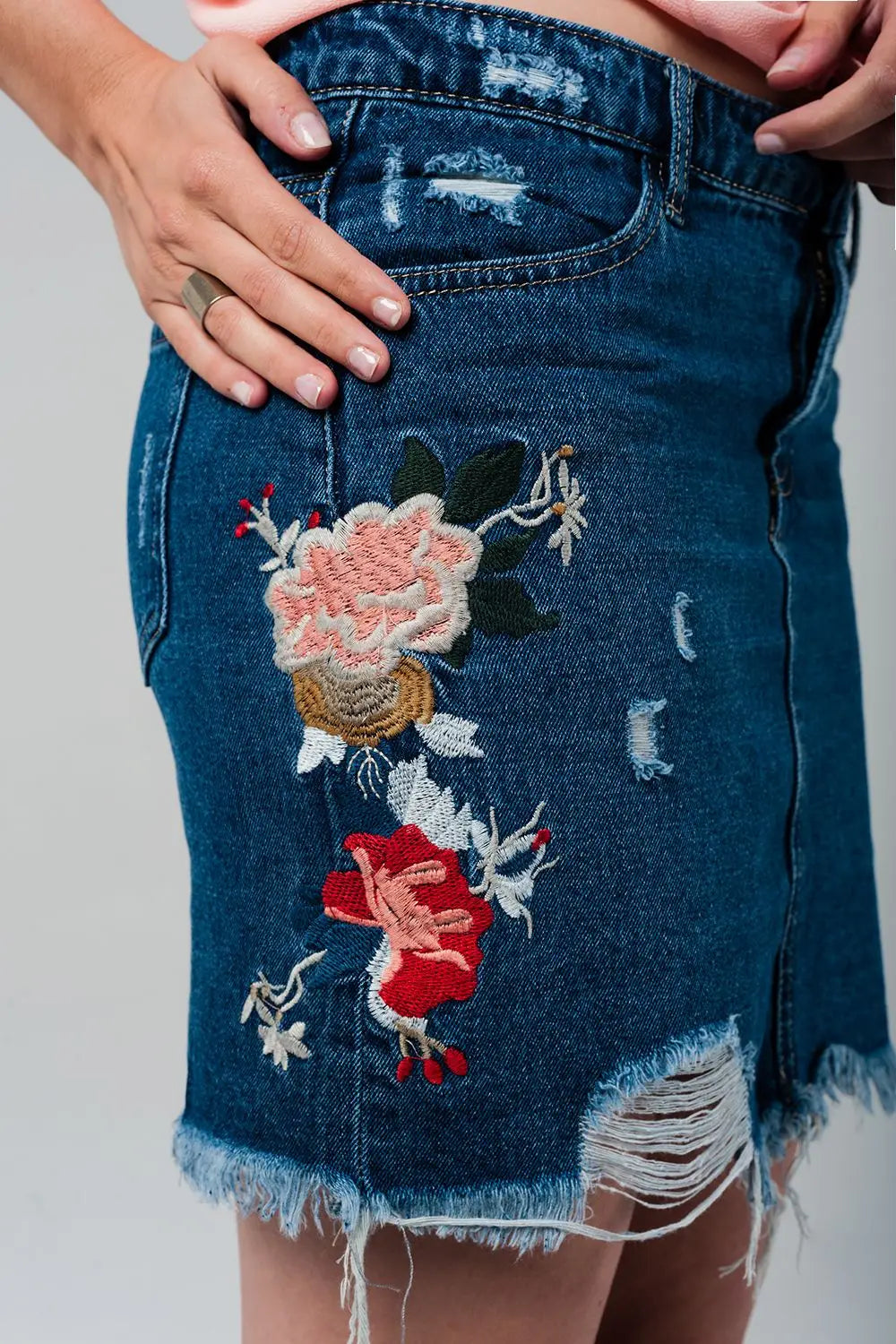 Denim mini skirt with embroidered flowers - Skirts