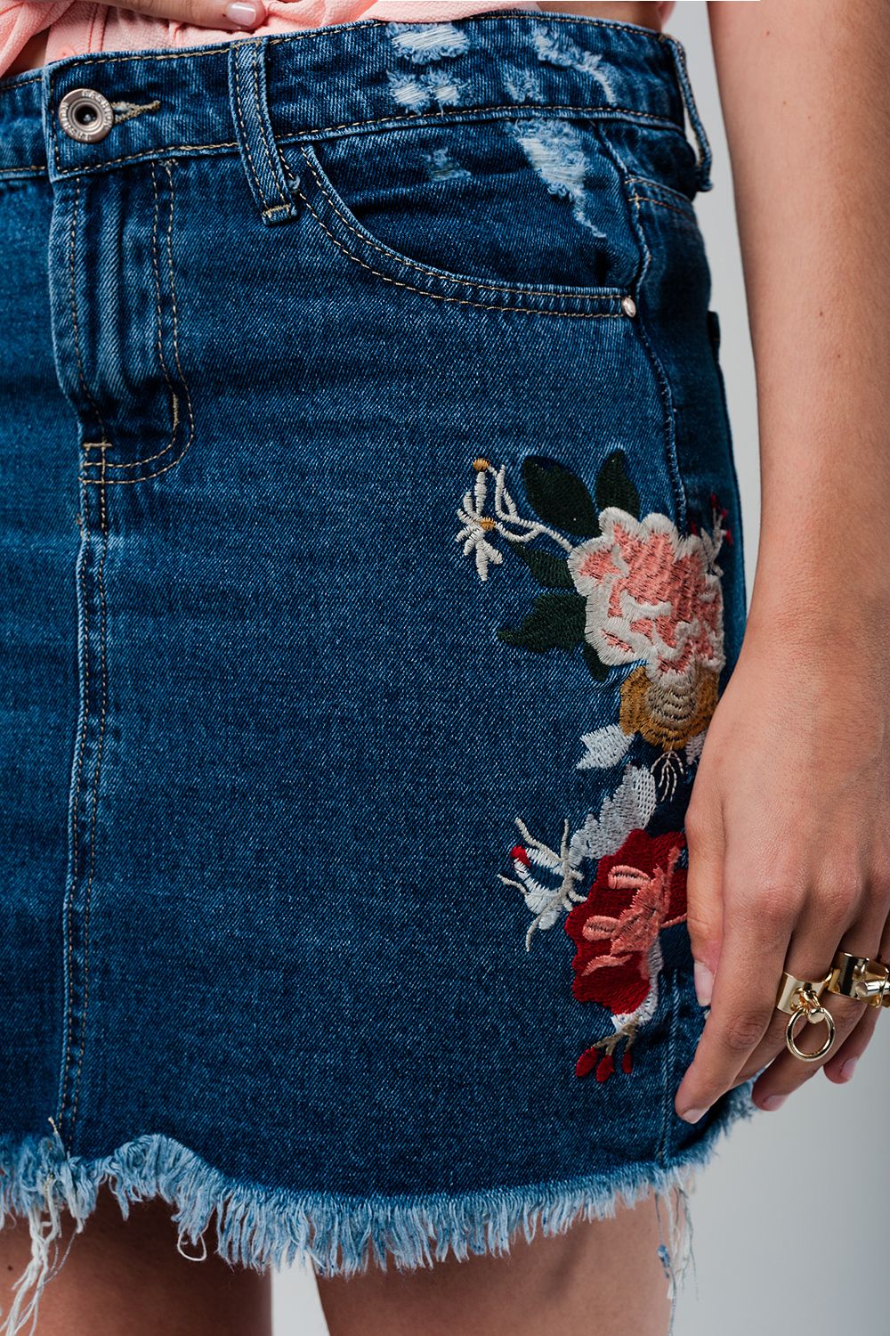 Denim mini skirt with embroidered flowers