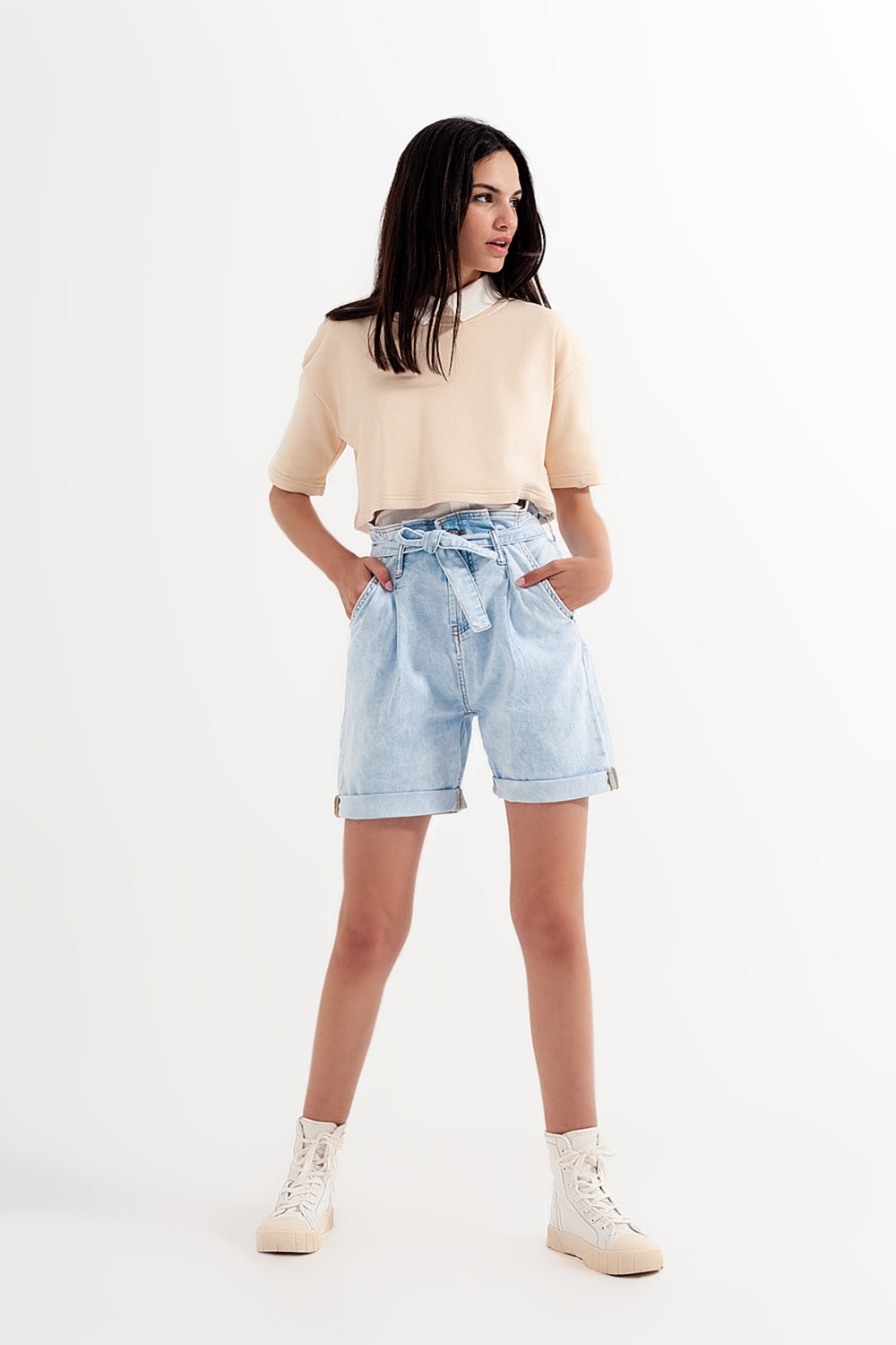 Denim shorts with light blue wash and waist tie