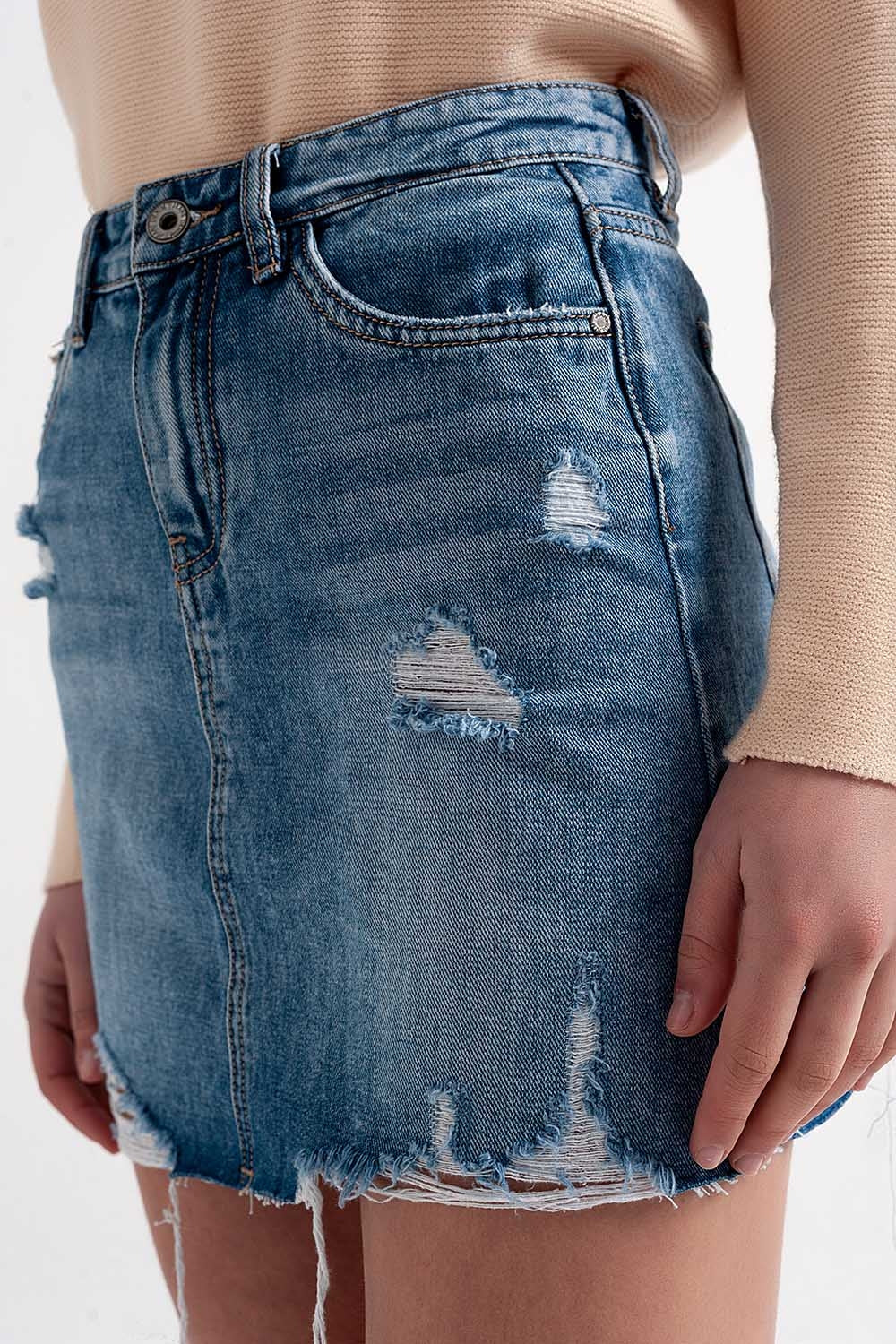 Distressed hem denim mini skirt