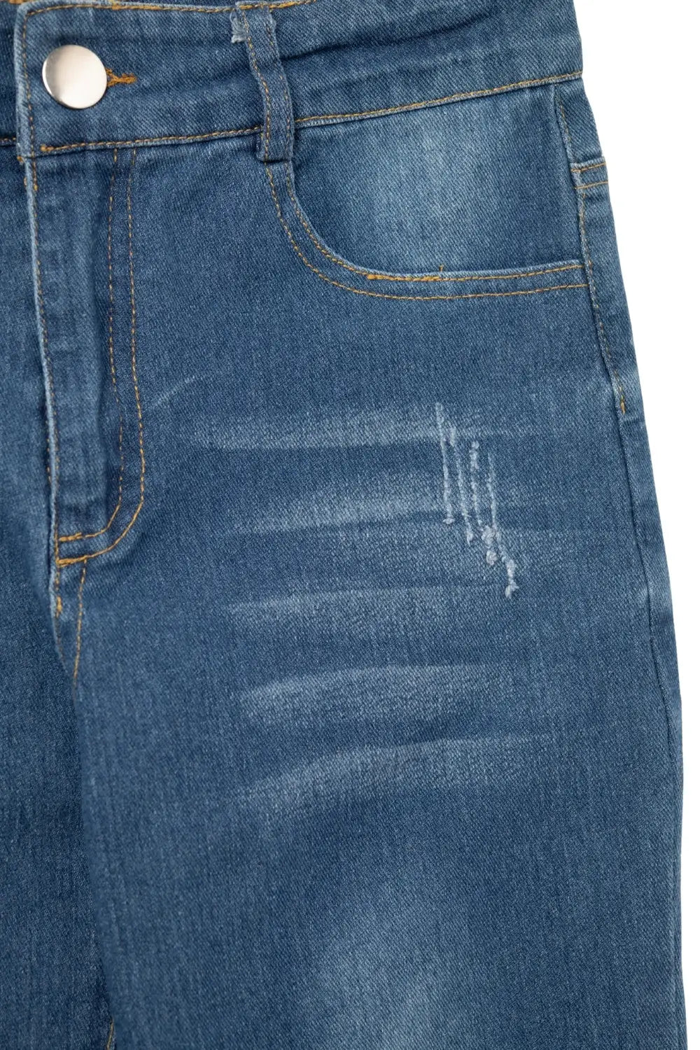 Distressed Skinny Jeans in Mid wash With Raw Edge - Jeans