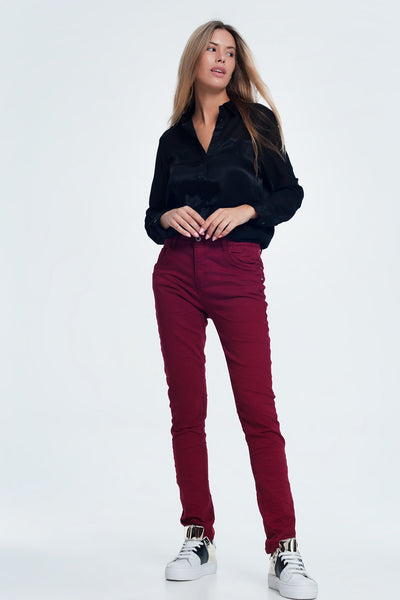 Drop crotch skinny jean in maroon