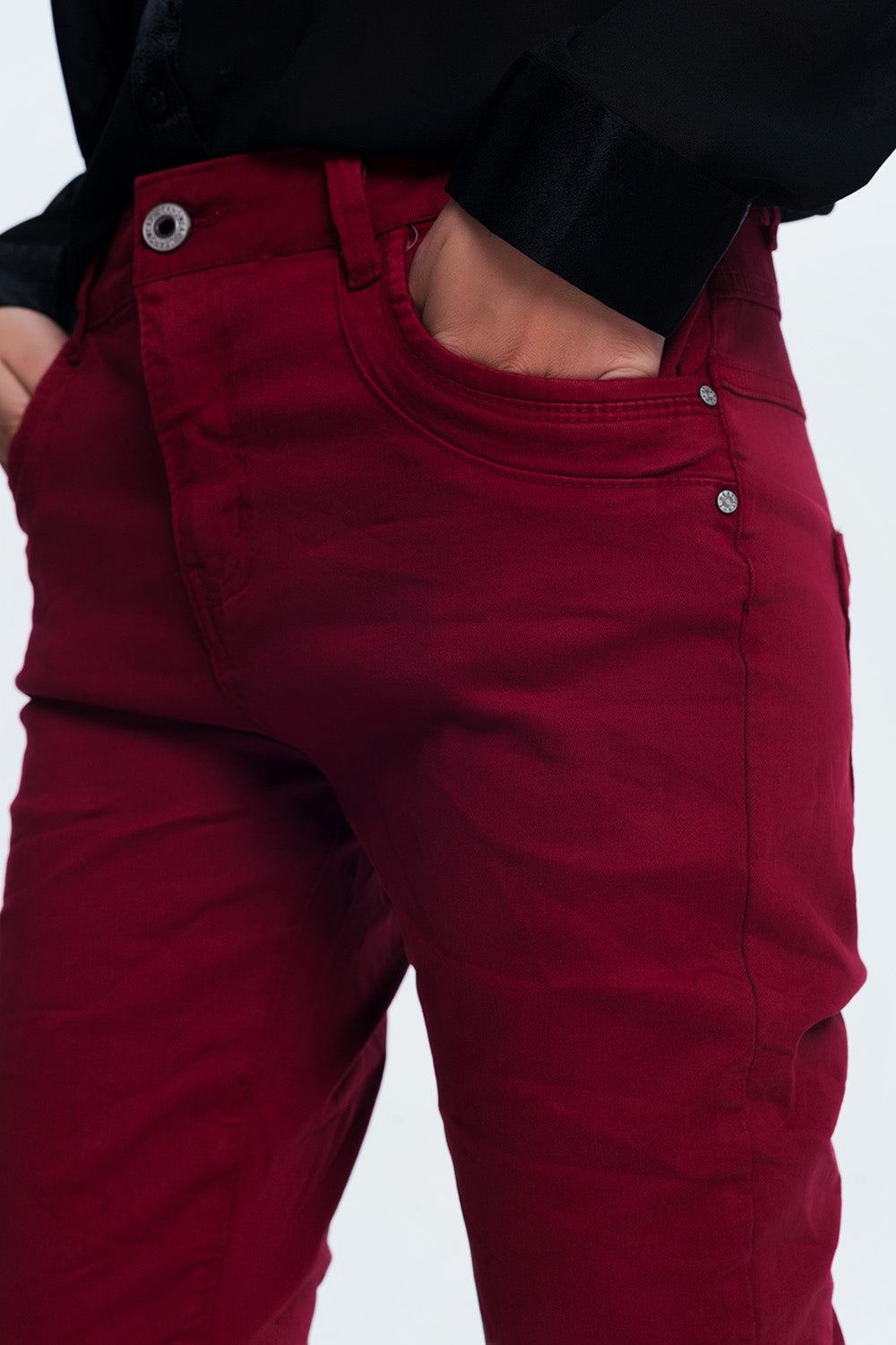 Drop crotch skinny jean in maroon