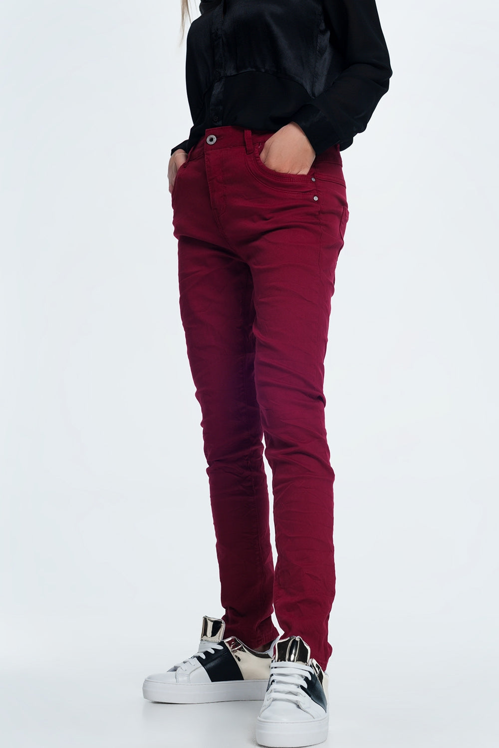 Drop crotch skinny jean in maroon