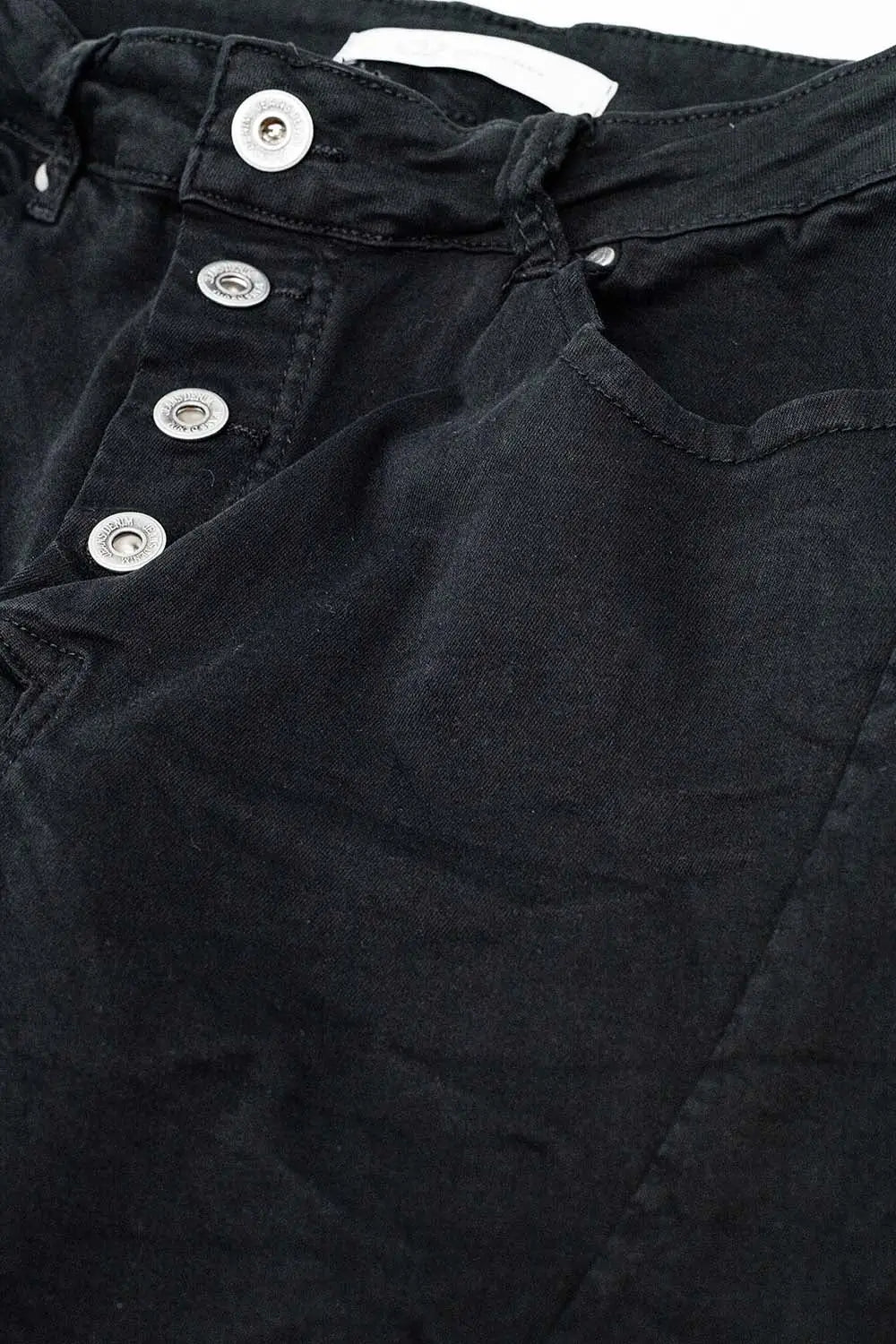 Exposed buttons skinny jeans in black - Pants