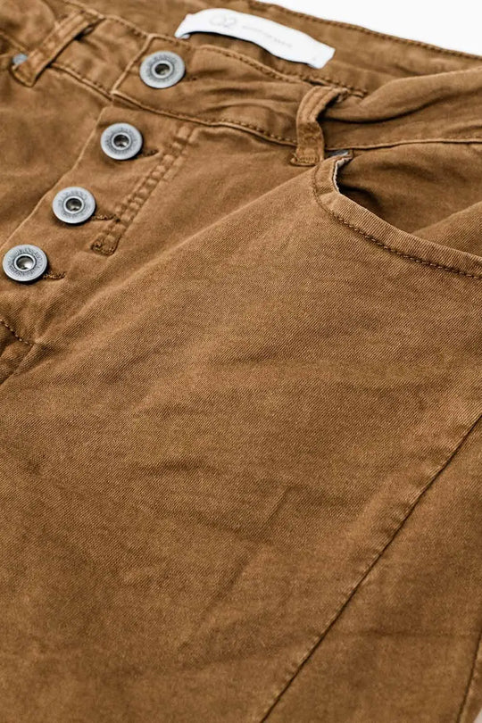 Exposed buttons skinny jeans in brown - Pants