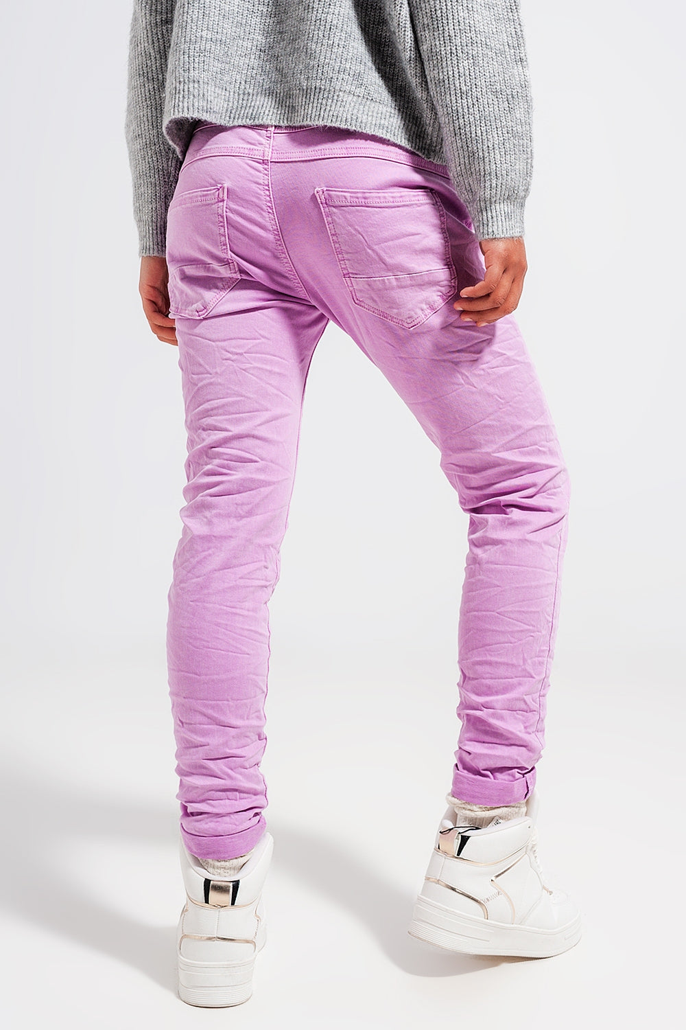 Exposed buttons skinny jeans in pink