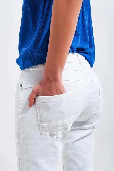 Exposed buttons skinny jeans in white - Jeans