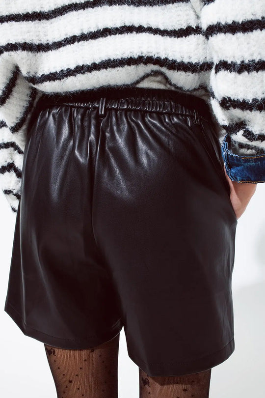 Faux leather oversized shorts with pleat down the front and pockets in black - Pants