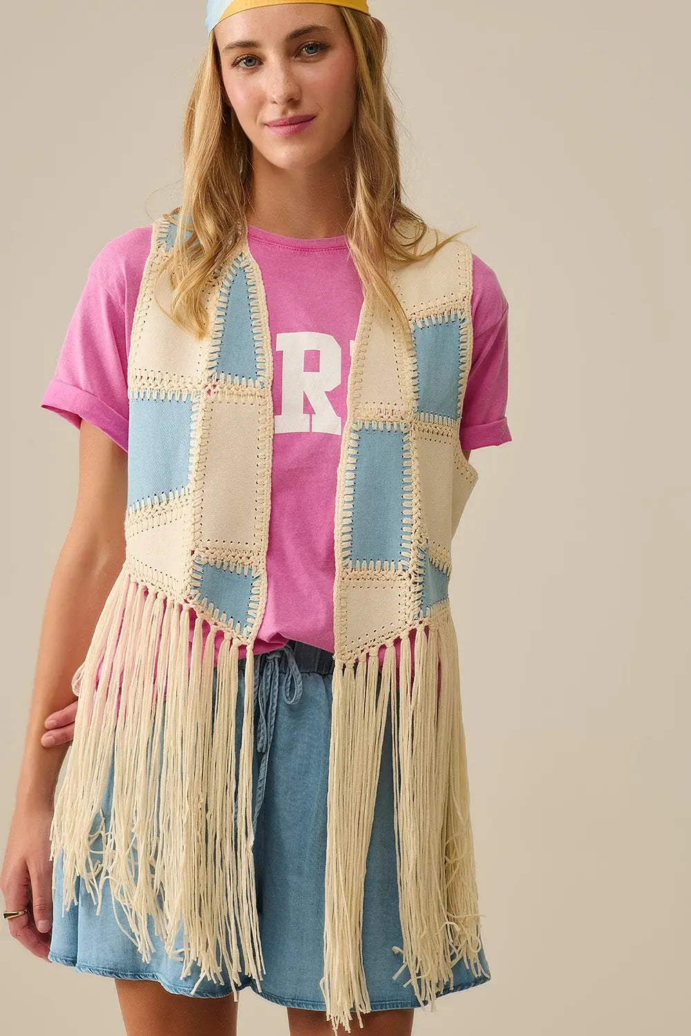 Q2 Faux leather vest with patchwork and fringe detail