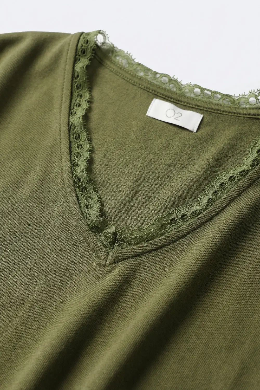 Fine and soft knit sweater with V-neck and lace trim in khaki - One Size / Green