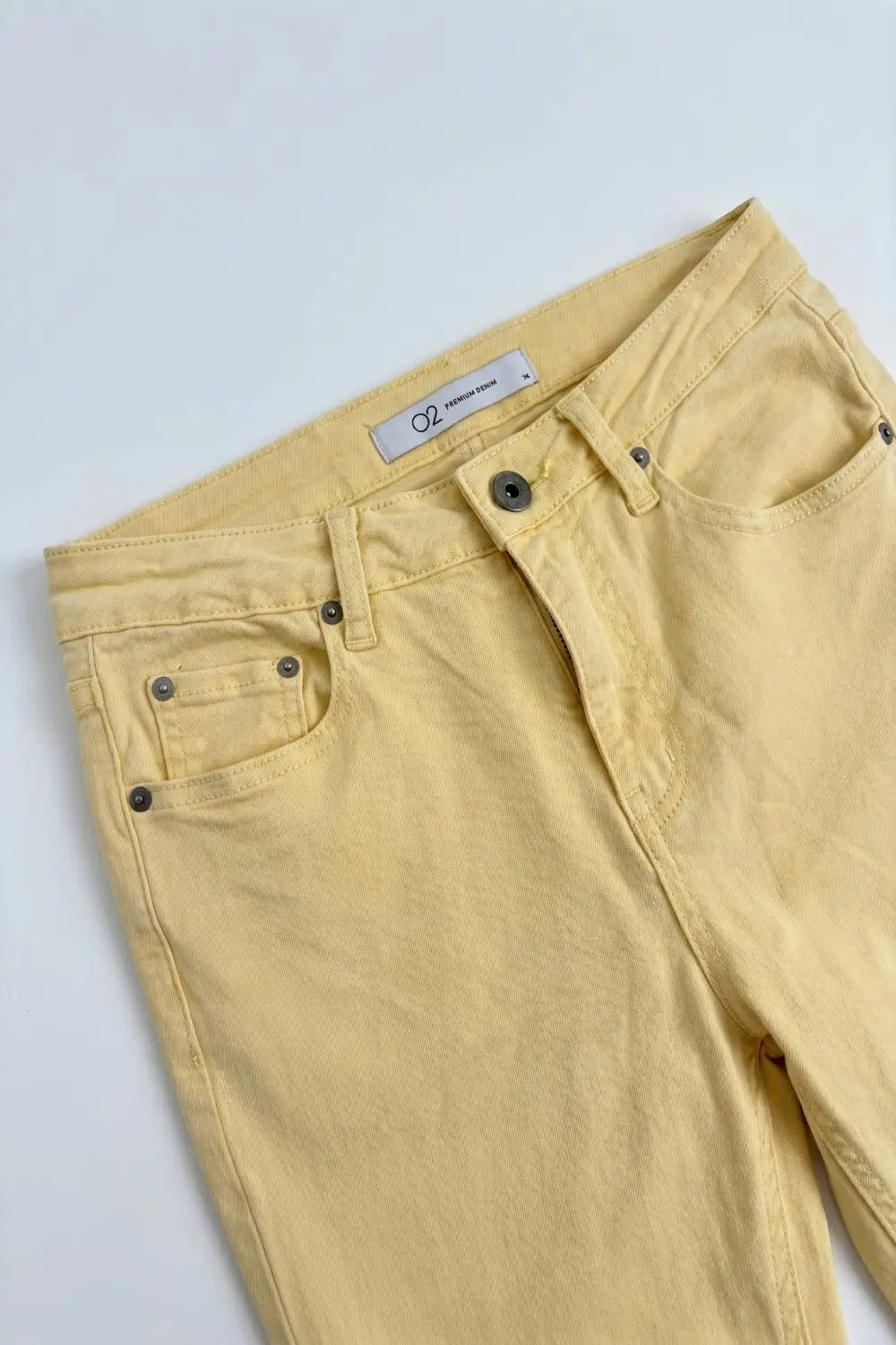 Flare jeans with raw hem edge in yellow color - Jeans