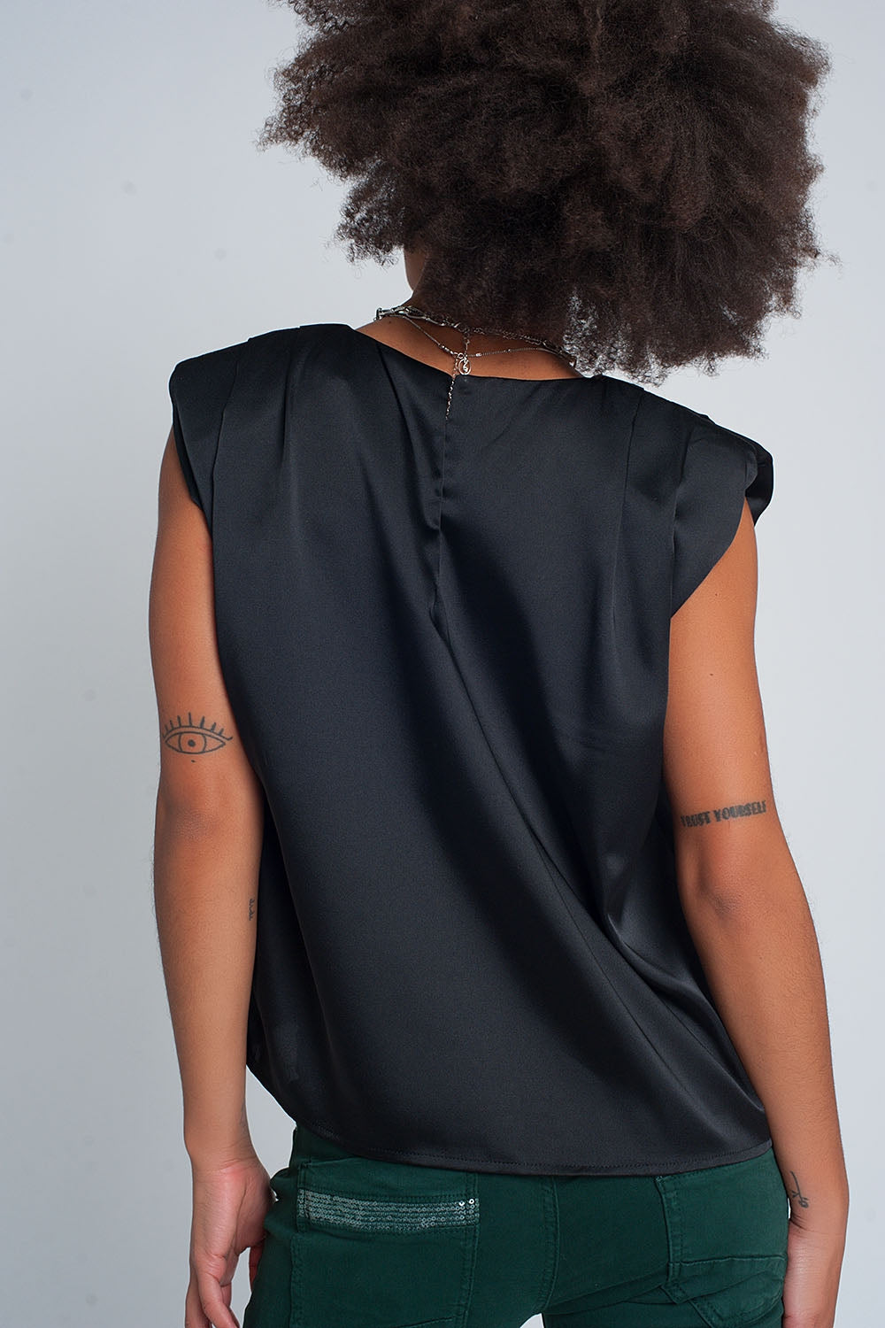 Gathered satin shoulder pad sleeveless top in black