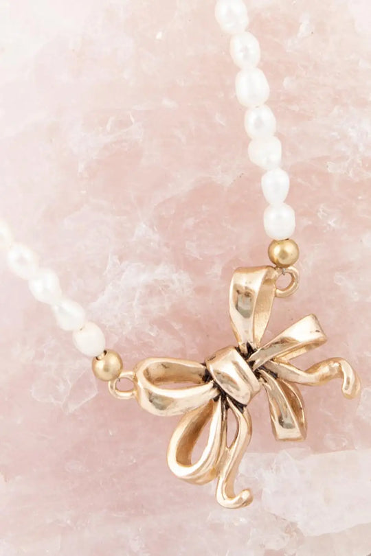 Gifted Freshwater White Pearl Golden Bow Pendant Necklace - Bracelets