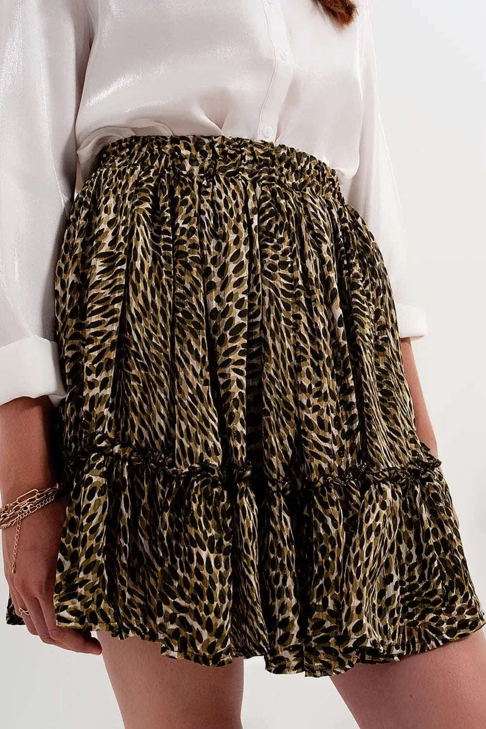 Green chiffon mini skirt with elastic waistband and shiny fabric - Skirts