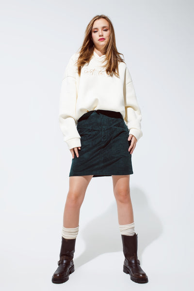 green corduroy miniskirt with pockets