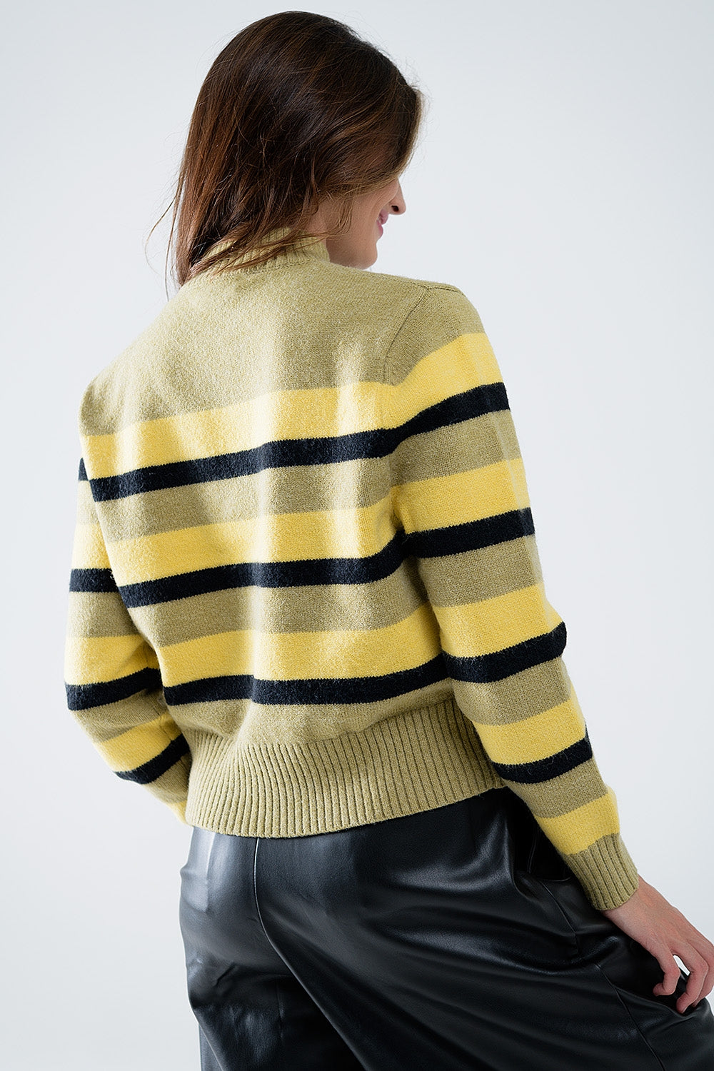 Green sweater with black and yellow stripes