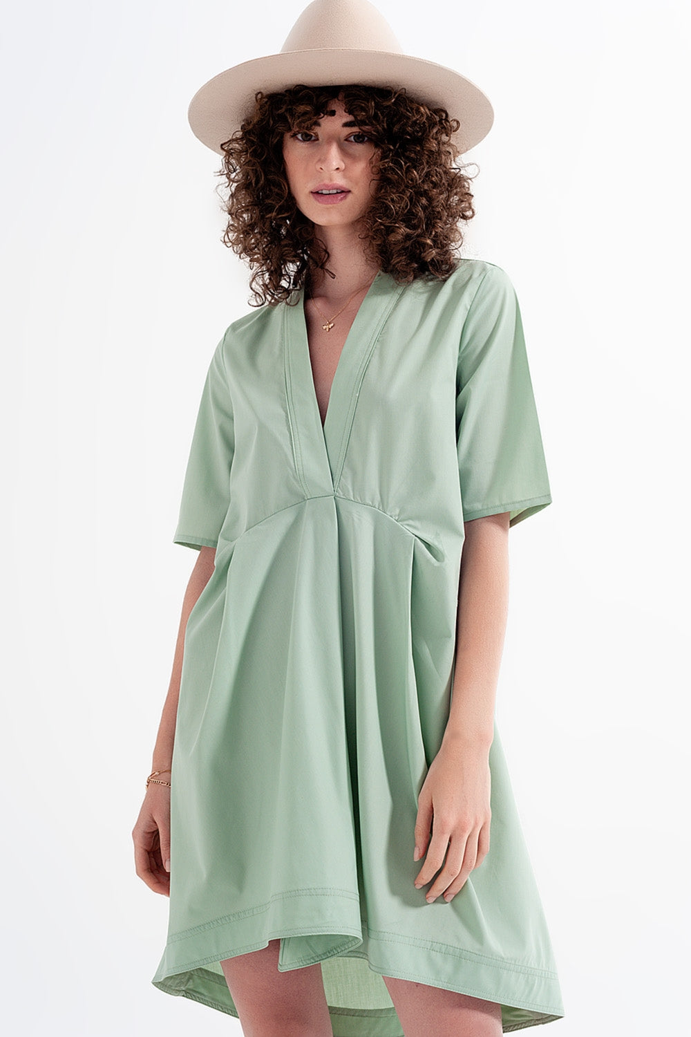 High low dress with empire waistline in green