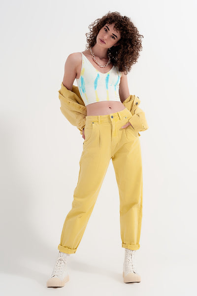 High rise mom jeans with pleat front in yellow