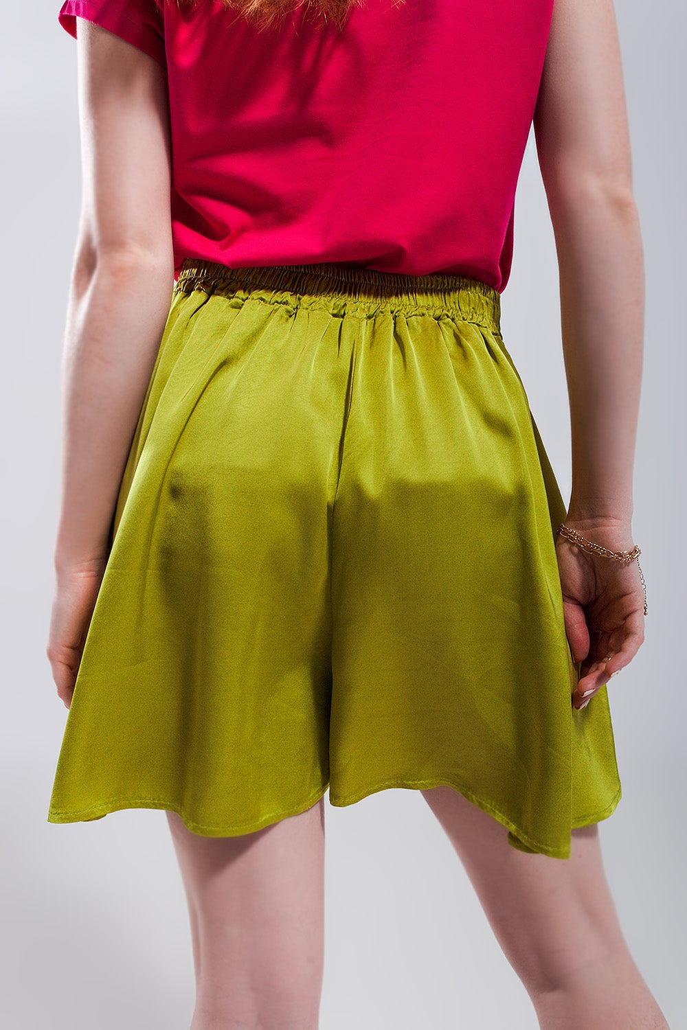 High rise satin shorts in lime green