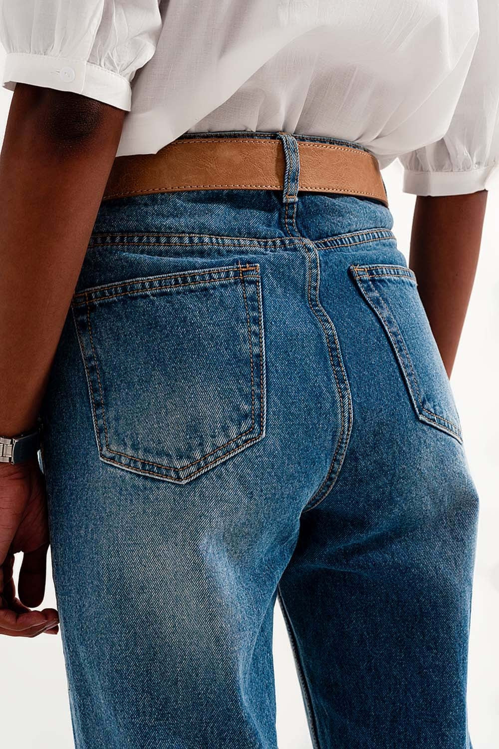 High rise slim mom jeans in midwash with rips