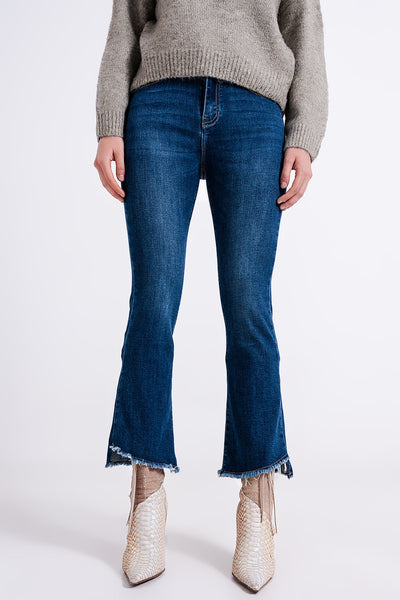 High waisted jeans with asymmetrical hem