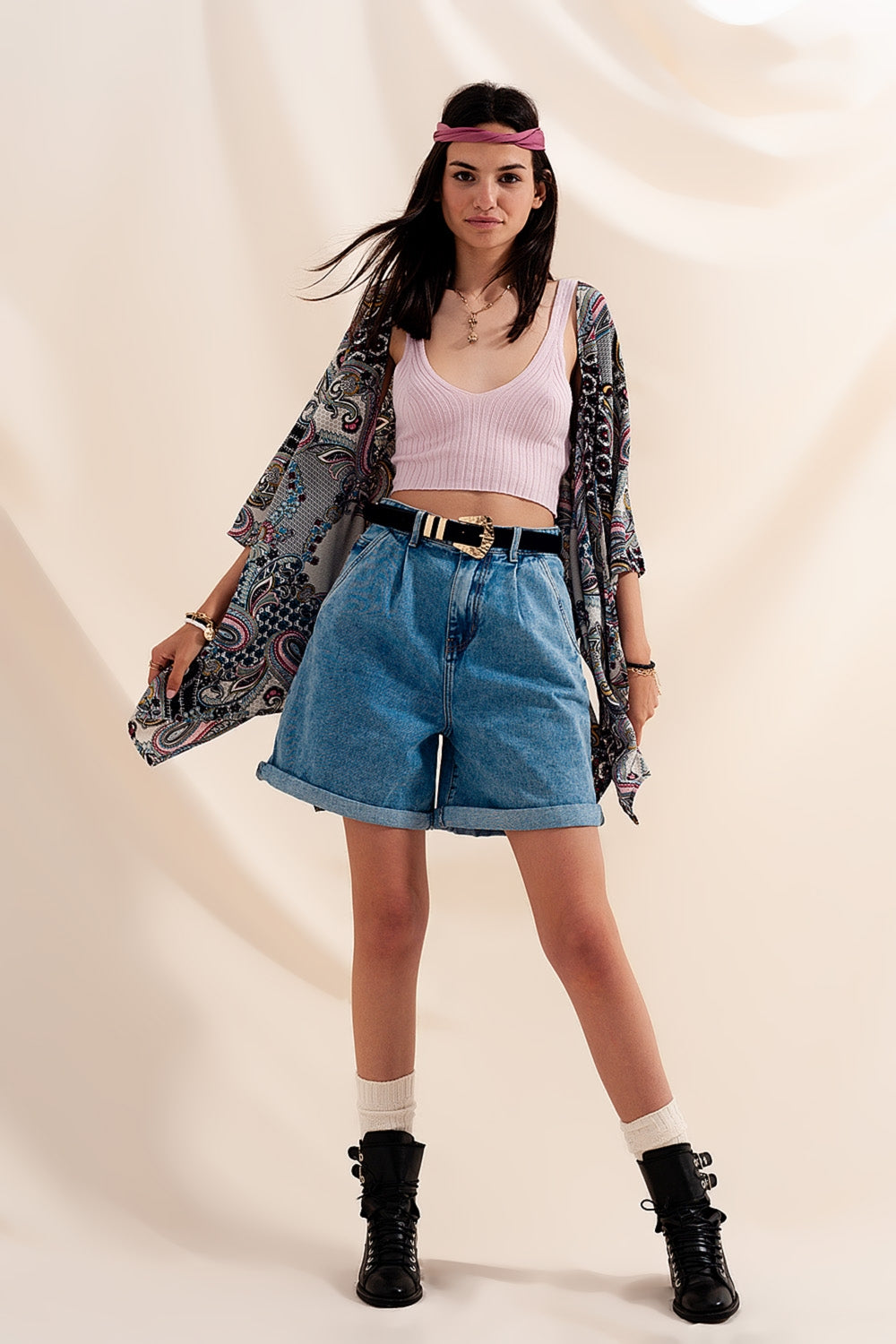 High waisted pleated denim shorts in mid wash