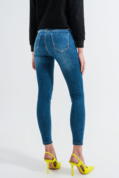 High waisted skinny jeans in mid blue