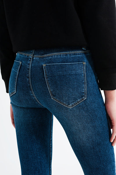 High waisted skinny jeans in mid blue