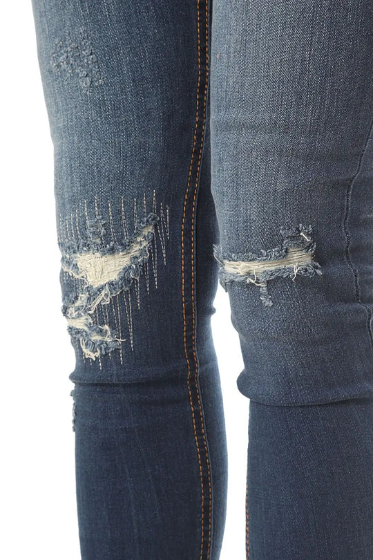 Highwaist skinny jean with distressed detailing - Jeans