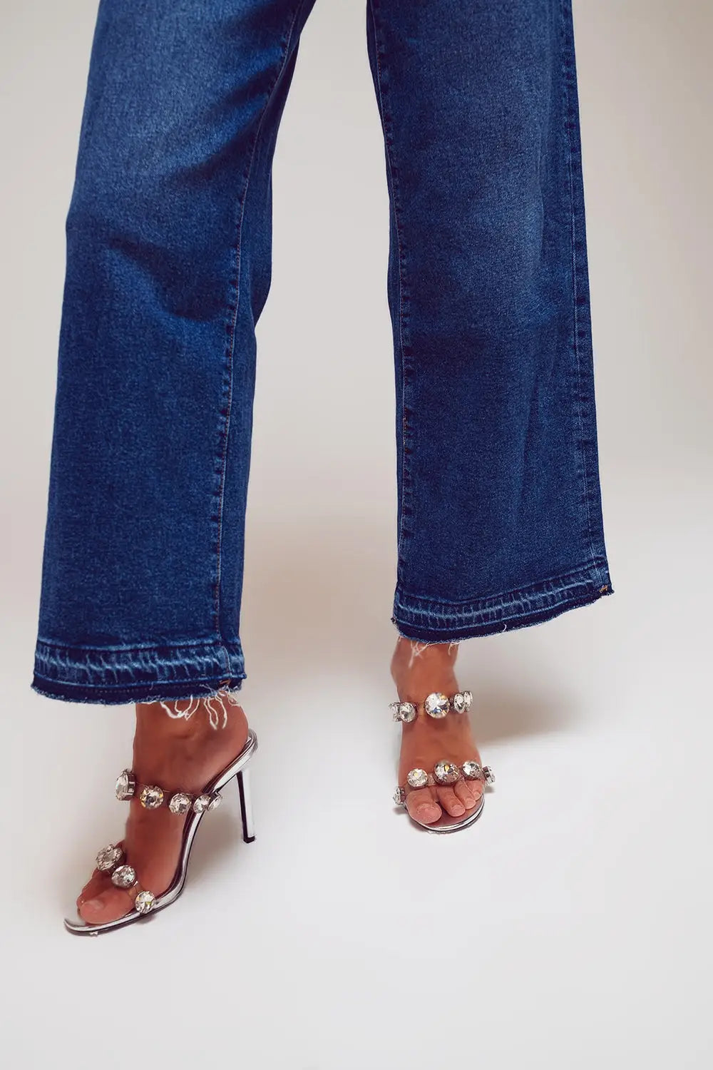 Jean à jambes larges avec détails d’ourlet en lavage moyen - Pantalons