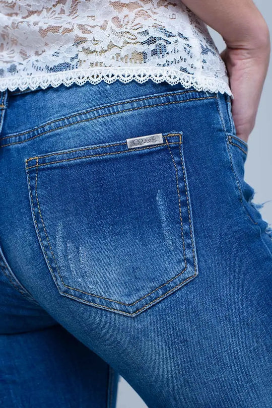 Jean avec déchirures déchiquetées et poignets à coupe brute - Pantalons