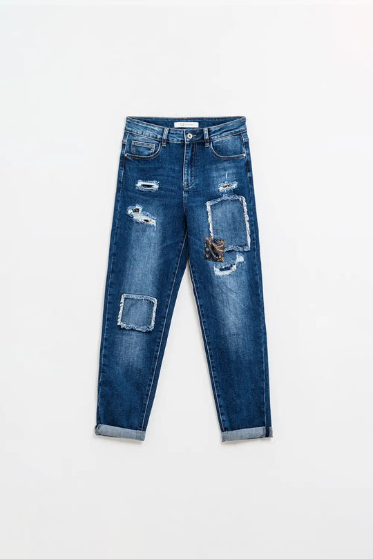 Jean bleu ample avec un motif déchiré subtil et des patchs - Pantalons