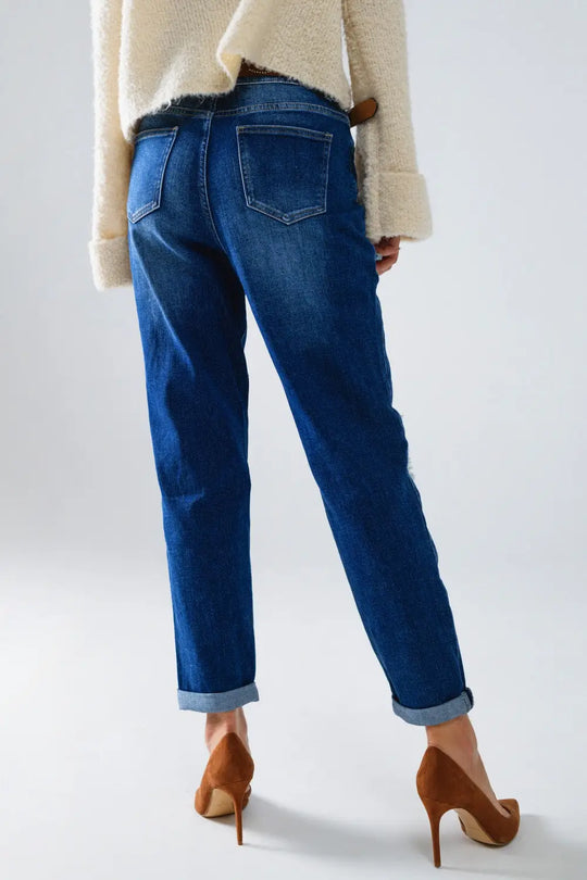 Jean bleu ample avec un motif déchiré subtil et des patchs - Pantalons