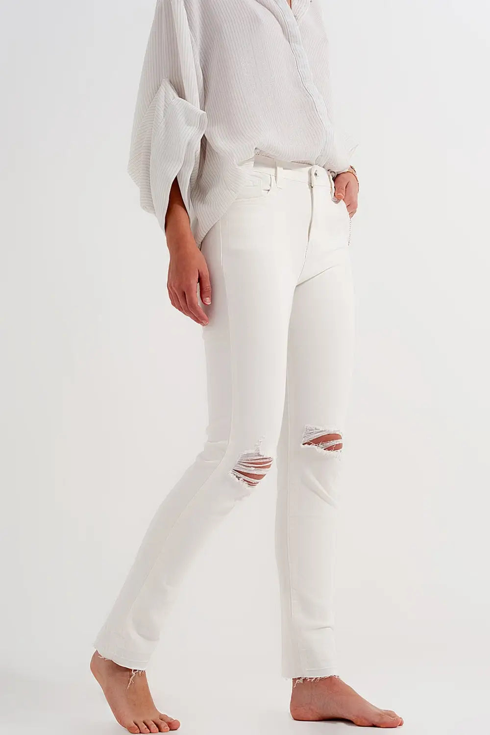 Q2 Jean déchiré avec ourlet à franges crème