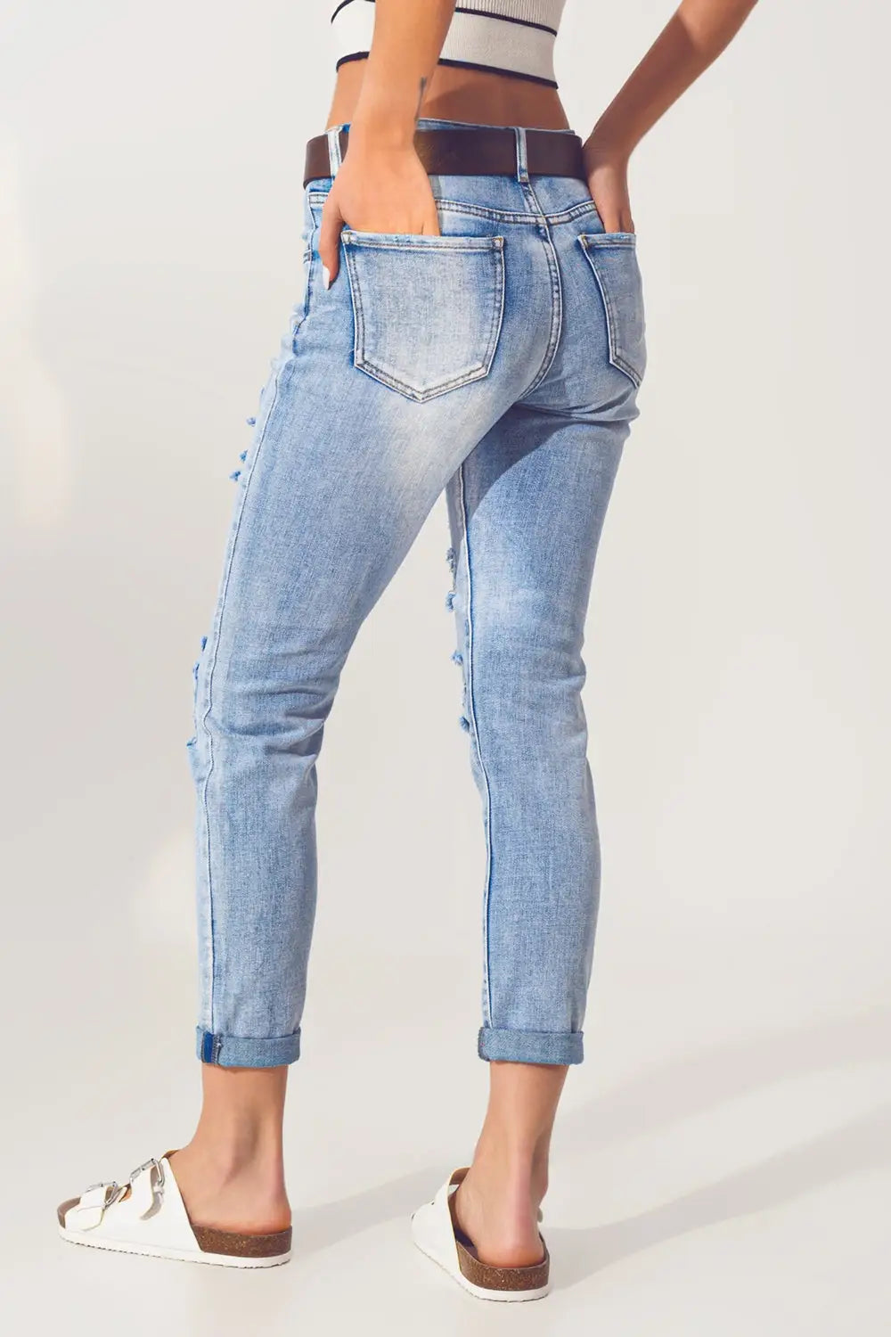 Jean déchiré extrême en bleu décoloré - Pantalons