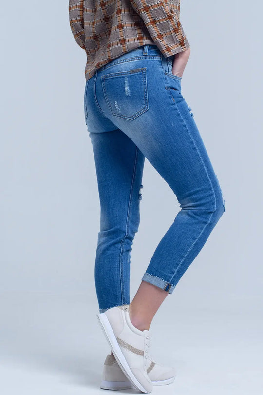 Jean maigre avec des déchirures sur les jambes - Pantalons