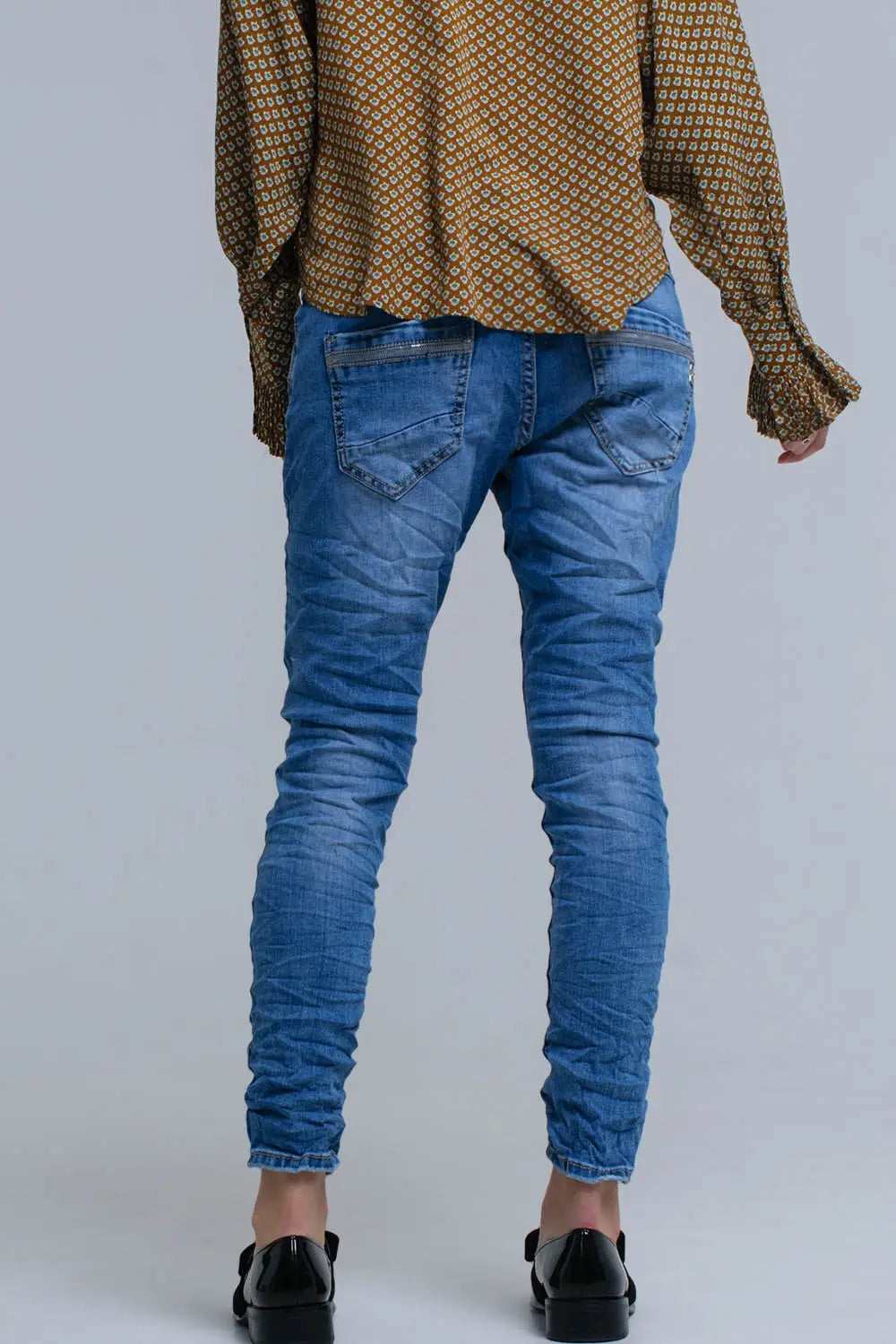 Jean skinny bleu avec des détails de paillettes - Pantalons