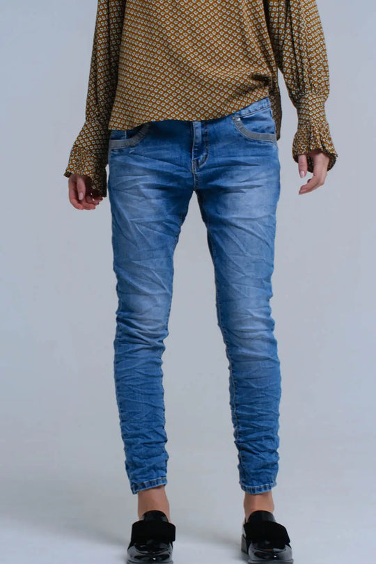Jean skinny bleu avec des détails de paillettes - Pantalons