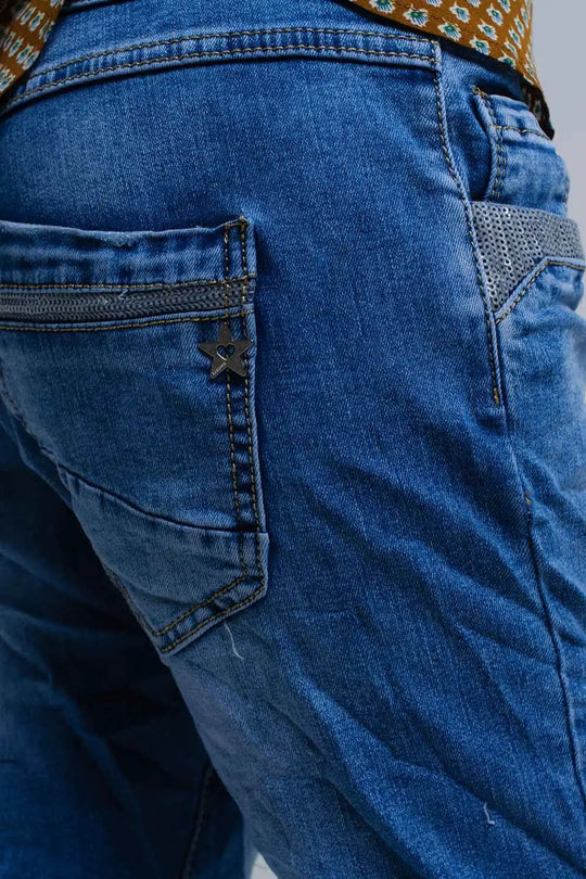 Jean skinny bleu avec des détails de paillettes - Pantalons