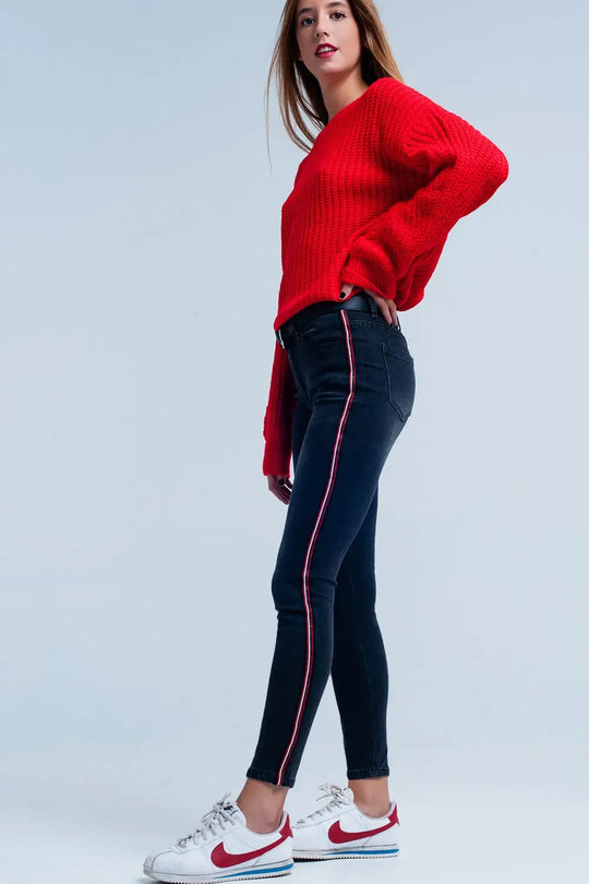 Jean skinny noir à rayures latérales rouges - Pantalons