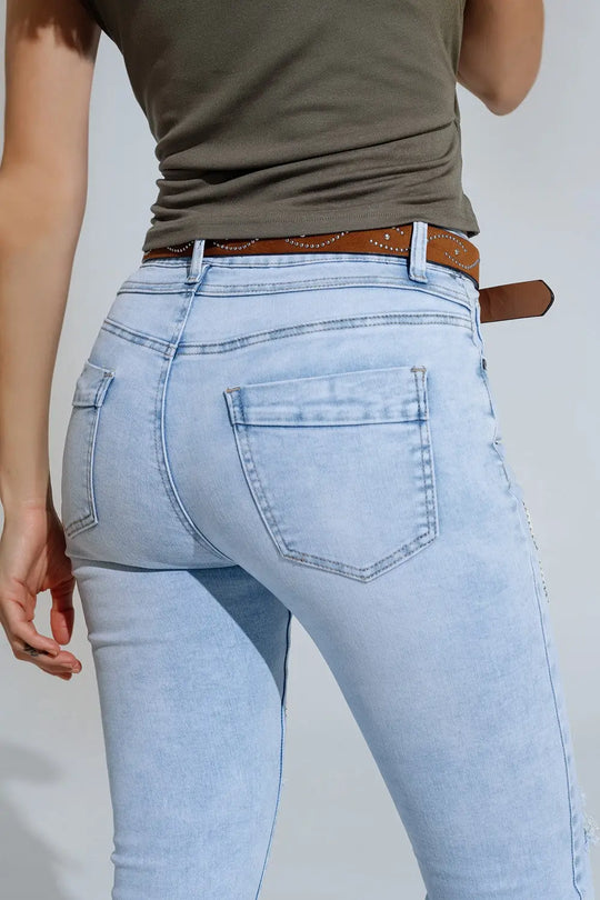 Jean super skinny bleu clair avec nœud papillon et trous déchirés - Pantalons