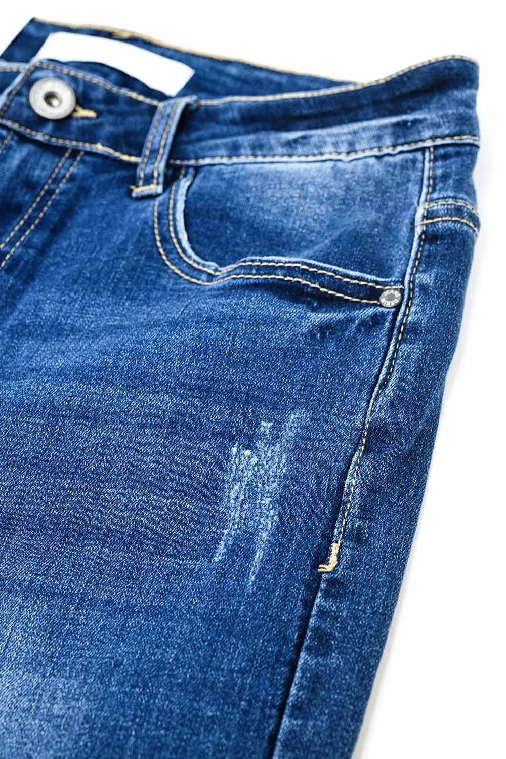 Jean super skinny en délavage moyen avec déchirures au bas de la jambe - Pantalons