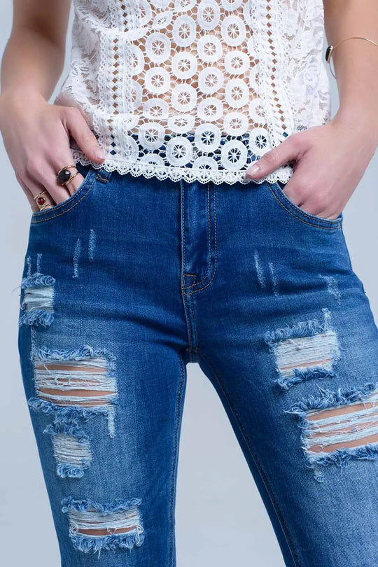 Jean with shredded rips and raw-cut cuffs - Jeans