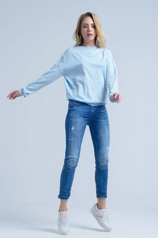 Jeans à la cheville avec déchirure et réparation - Pantalons
