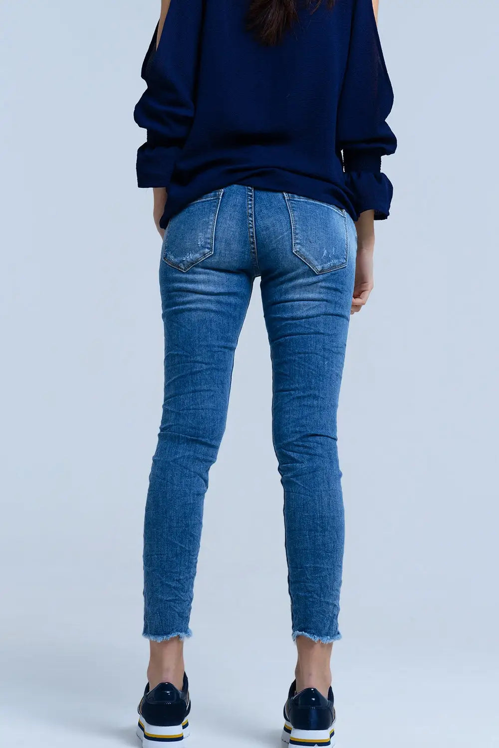 Jeans avec détails déchirés - Pantalons