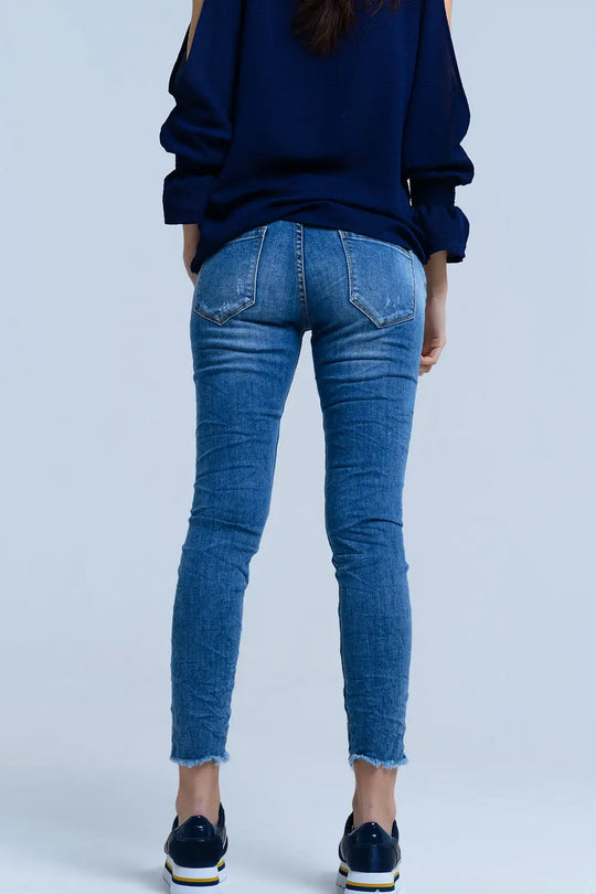 Jeans avec détails déchirés - Pantalons
