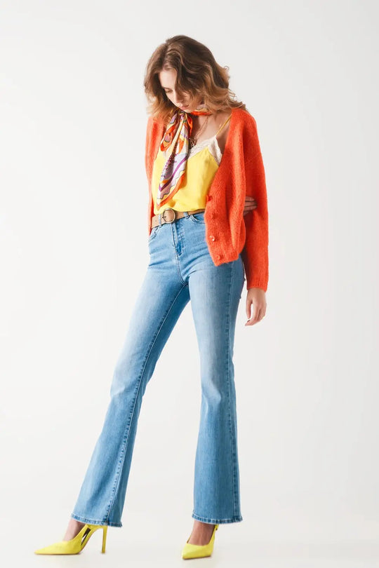 Jeans évasés taille haute des années 70 en denim extensible délavé clair - Pantalons